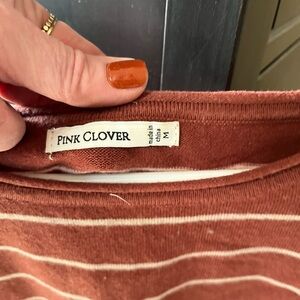 Orange & tan sweater, gently used. Medium
